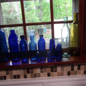 Photo of Assortment of Blue Bottles