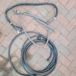 Photo of A four prong and a three prong dryer cord and a heavy duty extension cord