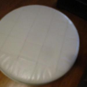 Photo of Round Faux Leather Coffee Table