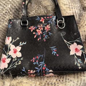 Photo of Guess large women’s black flower purse