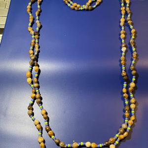 Photo of Vintage Nut Bead 34" Necklace in Very Good Preowned Condition as Pictured.