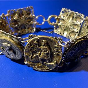 Photo of Vintage/Antique German Brass 7" Figural Bracelet in Good Preowned Condition.