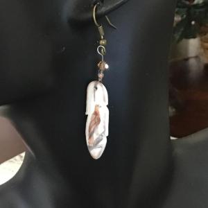 Photo of Red Tailed Hawk Feather Porcelain Earrings