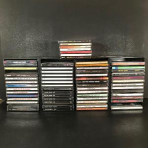 Photo of LOT 39L: Collection of CDs w/ 2 CD Racks - Jimmy Buffett, Andrea Bocceli, Johnny
