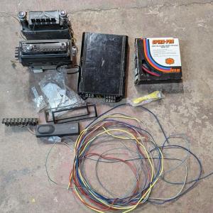 Photo of Motorola Solid State Car Radio, Amp, and Various Audio Items