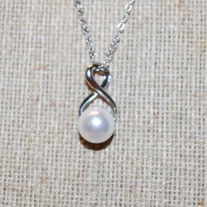 Photo of Faux White Pearl PENDANT (¾" x ¼") on a Figure 8 Setting and with a Silver Ton