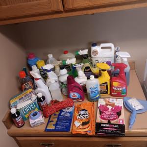 Photo of CLEANING SUPPLIES AND A LAUNDRY BASKET