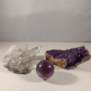 Photo of Natural Stone Specimens and Polished Orb