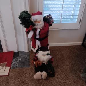 Photo of 34 INCH FREE STANDING ANIMATED OLD SAINT NICK AND A PLUSH SANTA