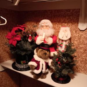 Photo of FAUX TREES IN HATS, ANIMATED SANTA AND MORE