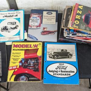 Photo of Ford Catalogs w/ Various Car Magazines