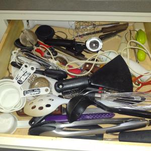 Photo of Collection of Kitchen Utensils and Cutlery