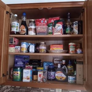 Photo of CUPBOARD FULL OF GROCERIES