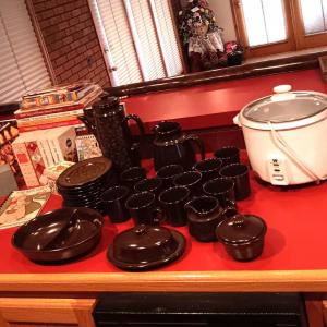 Photo of PARTIAL SET OF FRANCISCAN DINNERWARE, CROCK POT AND COOK BOOKS