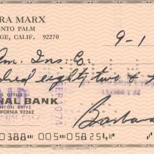 Photo of Barbara Marx signed check