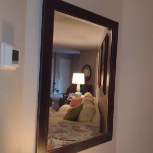 Photo of Beveled Wall Mirror in Wood Finish Frame- Approx 29 1/2" x 41"