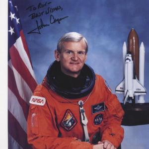 Photo of Astronaut John Casper signed official NASA photo