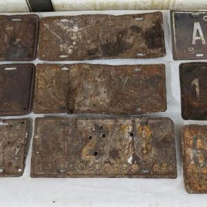 Photo of Varied Rusted Out License Plates