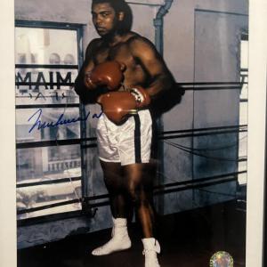 Photo of Muhammad Ali signed photo. GFA authenticated