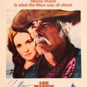 Photo of Lee Marvin 
signed lobby card. 