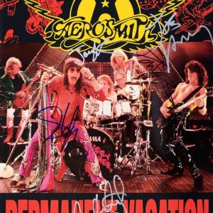 Photo of Aerosmith signed Permanent Vacation Tour Book