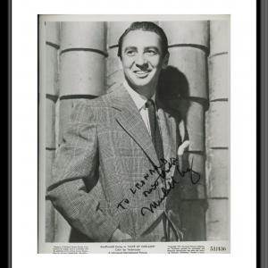 Photo of MacDonald Carey signed "Cave of Outlaws" movie photo 