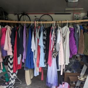 Photo of Multi Family Garage Sale - lots of clothes