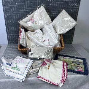 Photo of Basket of Linens Either New or Vintage