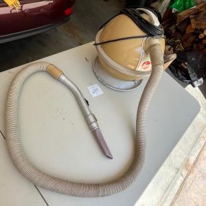 Photo of Vintage Hoover canister vacuum