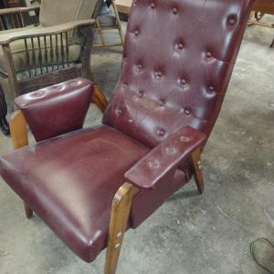 Photo of Vintage Wood Frame, Faux Leather Covered Chair