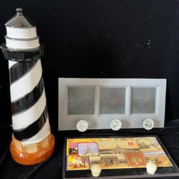 Photo of 2 WALL HUNG COAT RACKS AND A CERAMIC LIGHTHOUSE