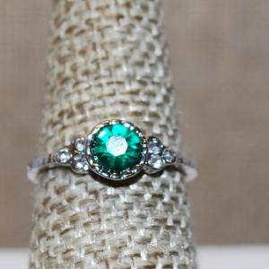 Photo of Size 7¼ Single Green Faceted Center Stone Set in a Round "Nest" Ring with 3 Cle