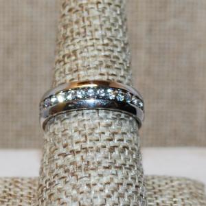 Photo of Size 8 Eternity Style Ring with Full Clear Stones Surround on a Silver Tone Band