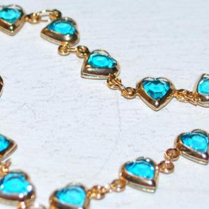 Photo of 12 Blue Hearts Bracelet with Gold Tone Surrounds & Chain 7" Circumference