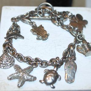 Photo of Metal "Seaside" Themed 9 Charms Bracelet with Toggle Clasp 8" Circumference