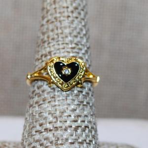 Photo of Size 8 Single Small Clear Center Stone Ring in a Black & Gold Heart Setting and 