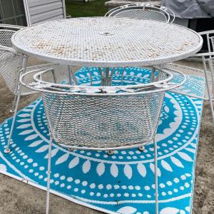 Photo of LOT 82: White Wrought Iron Round Table, Four Chairs and Accent Rug