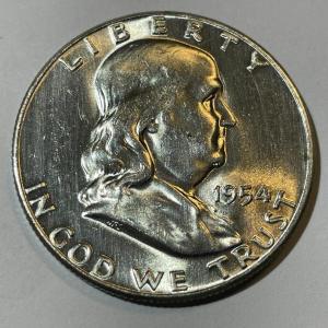 Photo of 1954-P UNCIRCULATED CONDITION FRANKLIN SILVER HALF DOLLAR AS PICTURED.