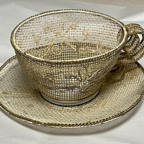 Photo of Vintage Filigree Mesh Cup & Saucer Decor in Good Preowned Condition.