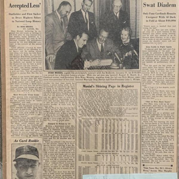 Photo of Stan Musial signed check with vintage newspaper