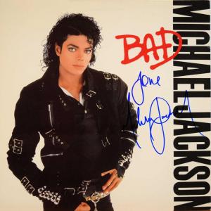 Photo of Michael Jackson signed Bad album
