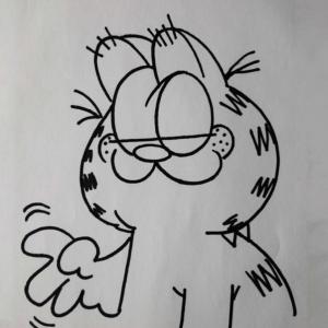 Photo of Jim Davis signed Garfield  sketch