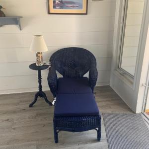 Photo of LOT:82: Blue Painted Wicker Loung Chair and Side Table Along with a Seashell Lam