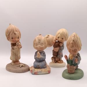 Photo of LOT 49: Set of 4 Goebel Hallmark Betsey Clark Figurines