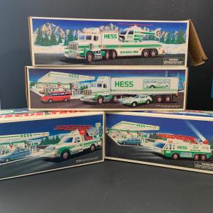 Photo of LOT:106: Collection of 4 Hess Trucks in Original Boxes with the Batteries Remove