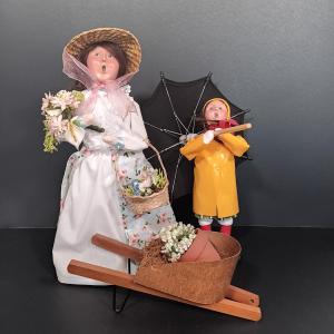 Photo of LOT 130: Byers Choice Woman Selling Flowers & Girl with Umbrella