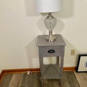 Photo of LOT:105: Wooden Side Table Painted Gray and a Crystal and Crome Table Lamp