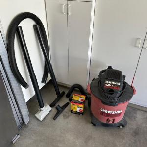 Photo of CRAFTSMAN SHOP VAC WITH ATTACHMENTS AND EXTRA FILTERS
