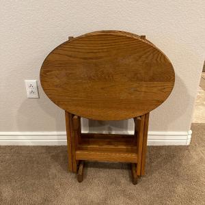 Photo of 4 OVAL WOODEN TV TRAYS ON A STAND