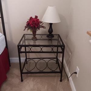 Photo of 2 TIER IRON FRAME SIDE TABLE WITH GLASS TOP, SMALL LAMP AND SILK FLOWERS